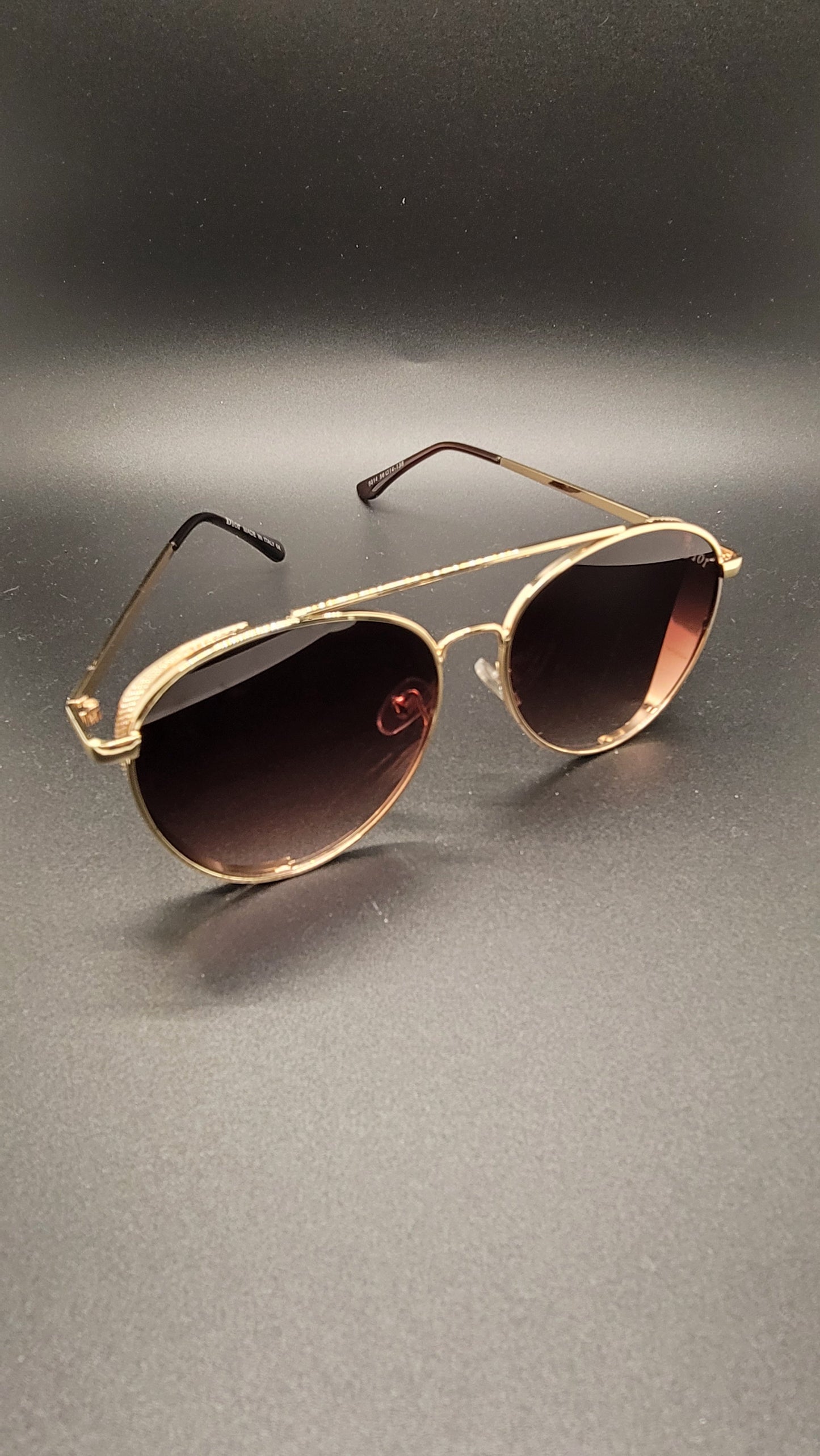 Gold wire frame with shades lens