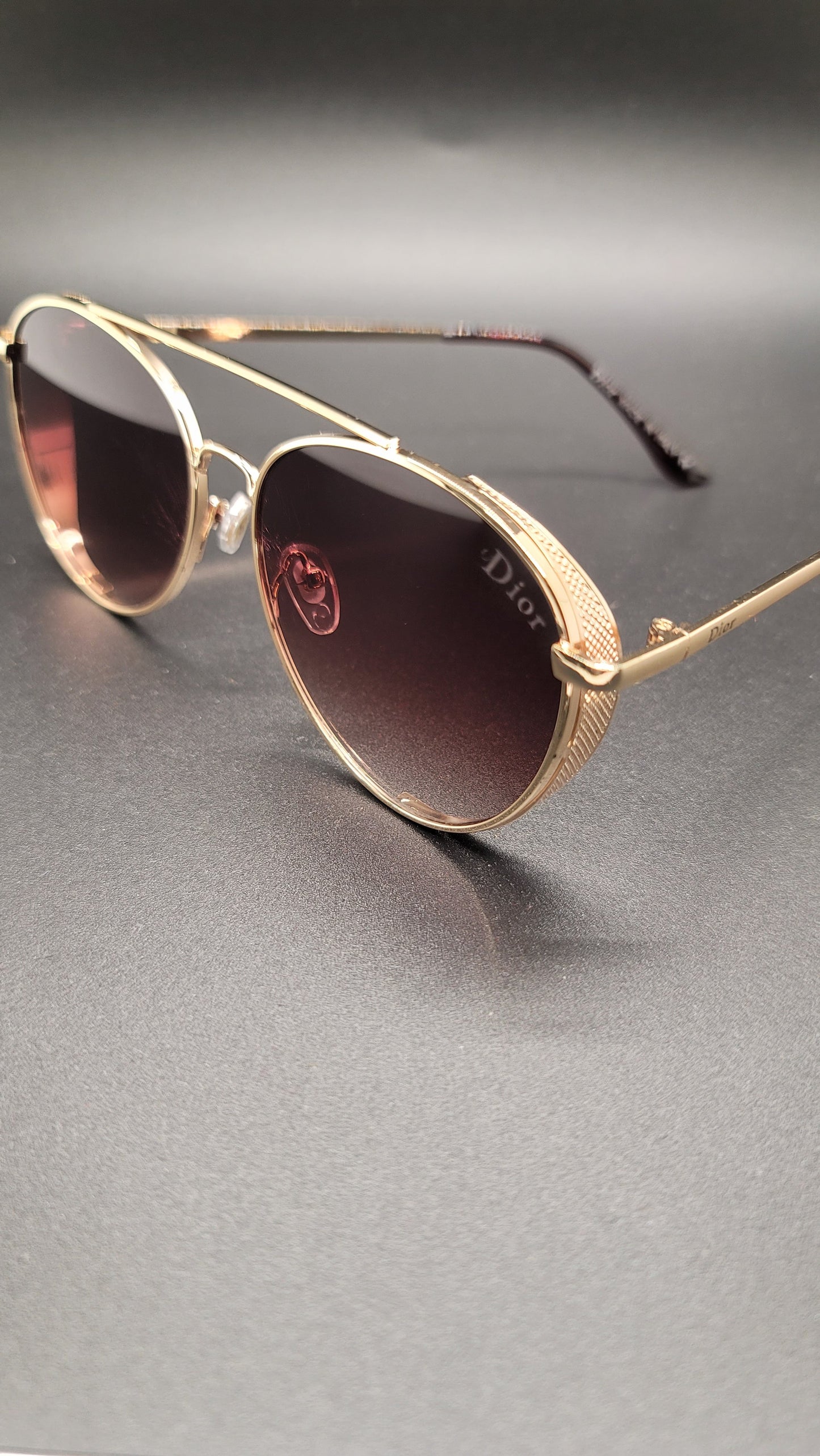 Gold wire frame with shades lens